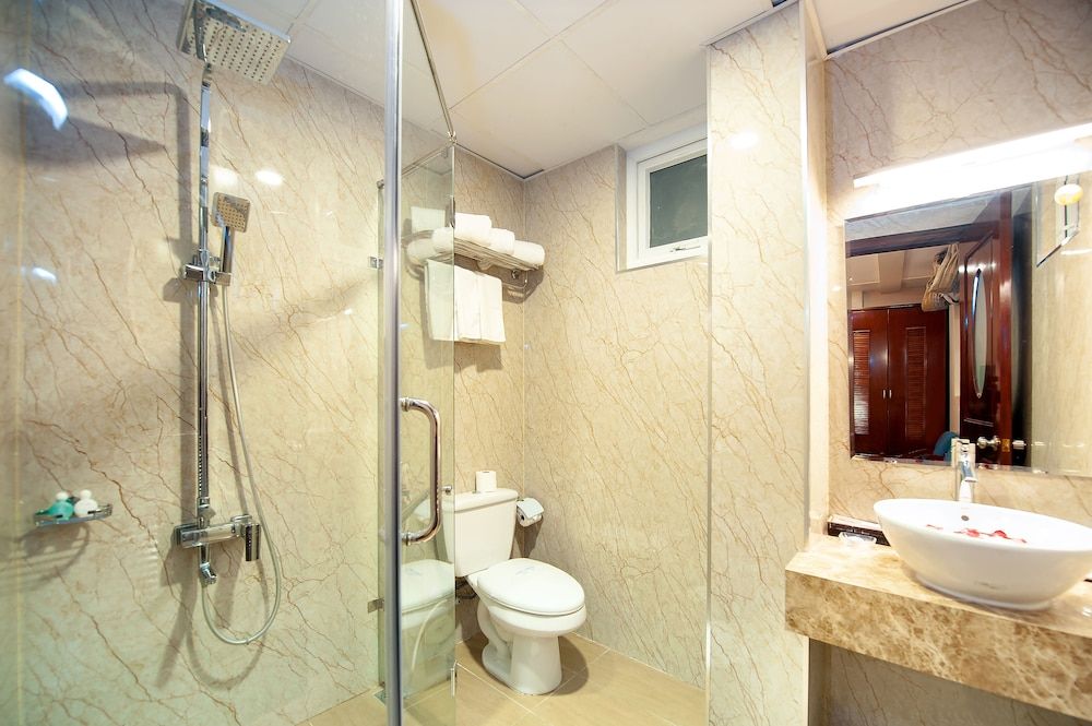 Eden Garden Hotel Deluxe Triple Room 5