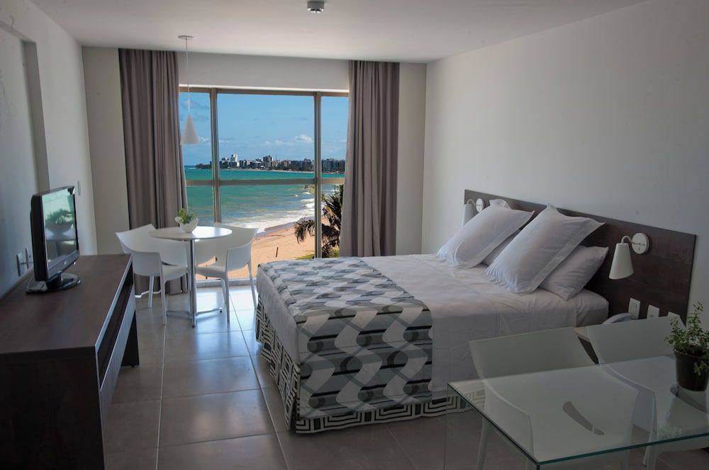 Quarto casal luxo, cozinha, vista para o mar (Life Luxo)
