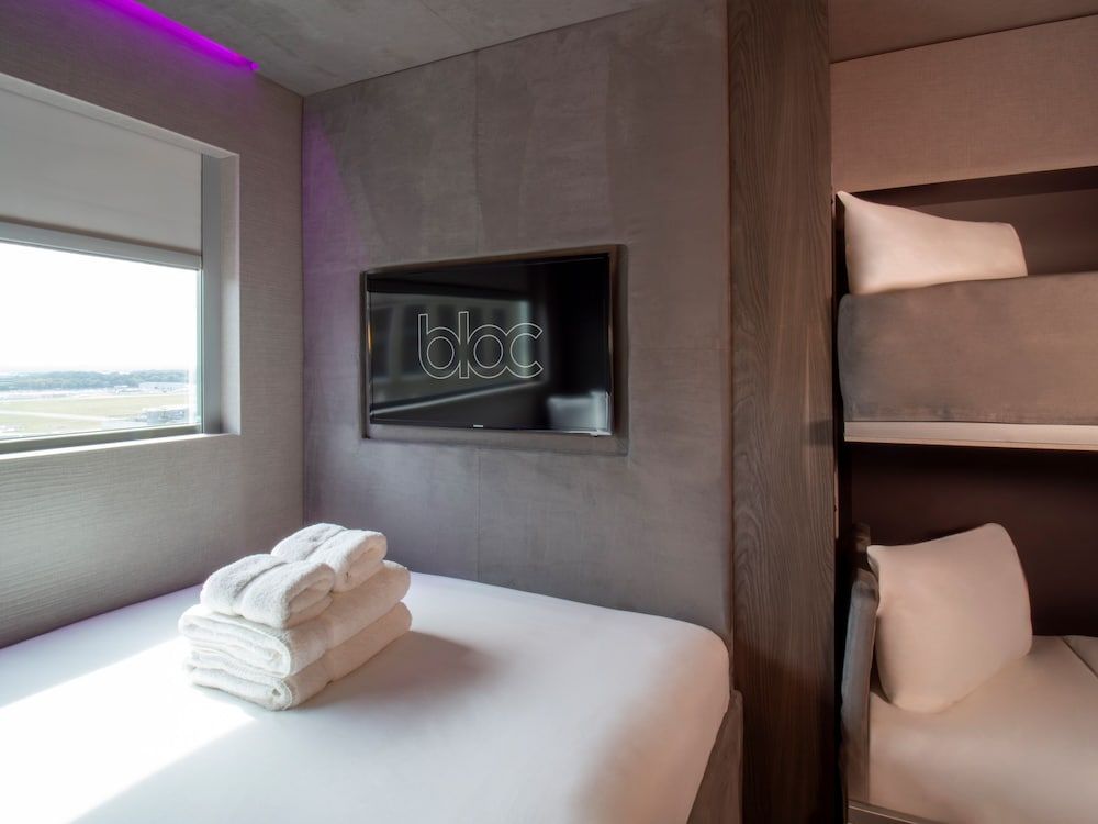 Family Room, One King Bed and 2 Bunk Beds (only children age 12 or under can use the bunk bed)