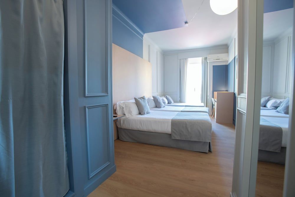 Triple Room (2 Adults + 1 Child)