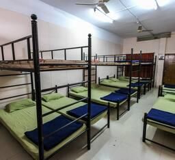 Single Bed in Dormitory Room