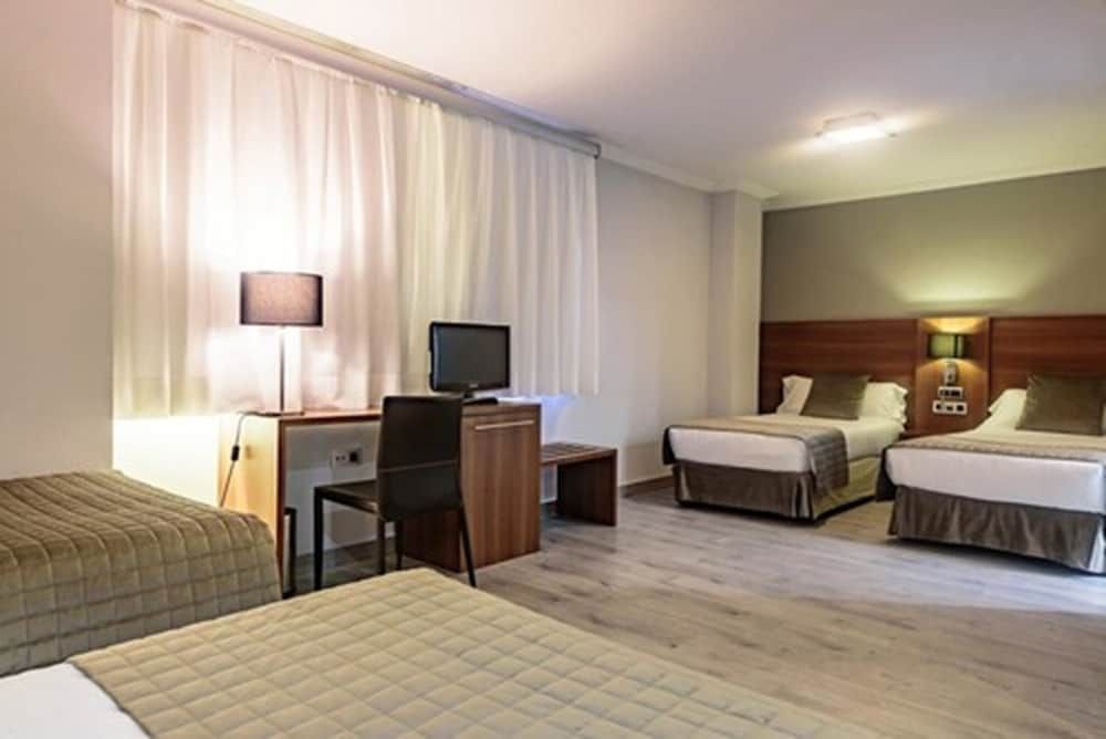 Triple Room (+ Extra bed adult)