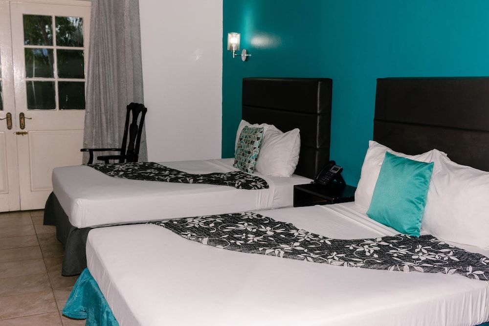 Comfort Room, 2 Double Beds, Garden View