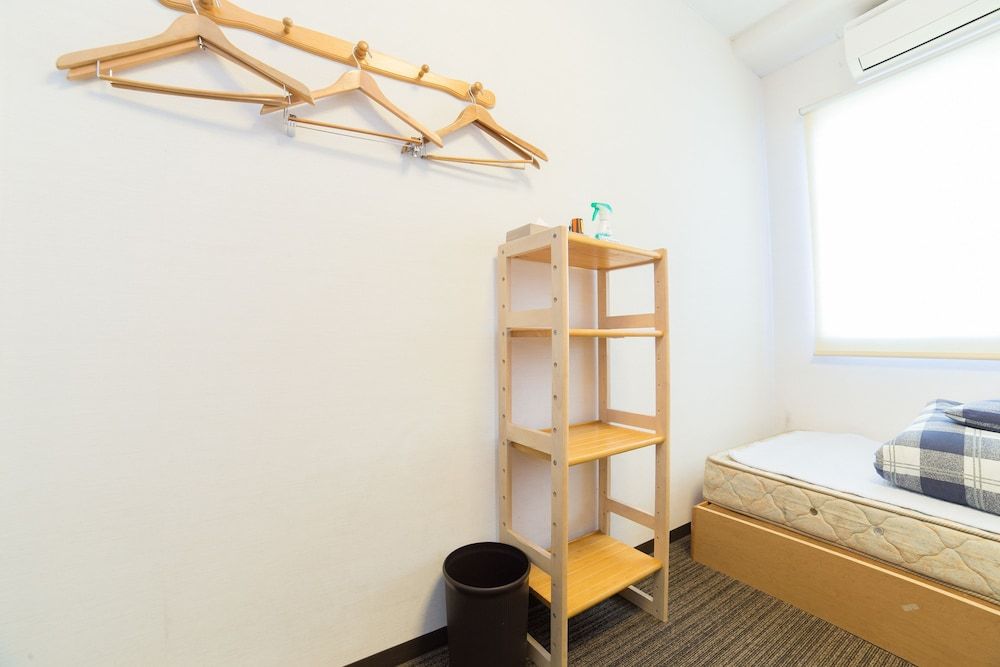 Triple Room (Shared Bathroom)