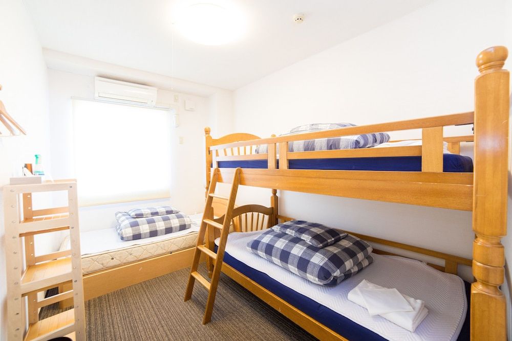 Triple Room (Shared Bathroom)