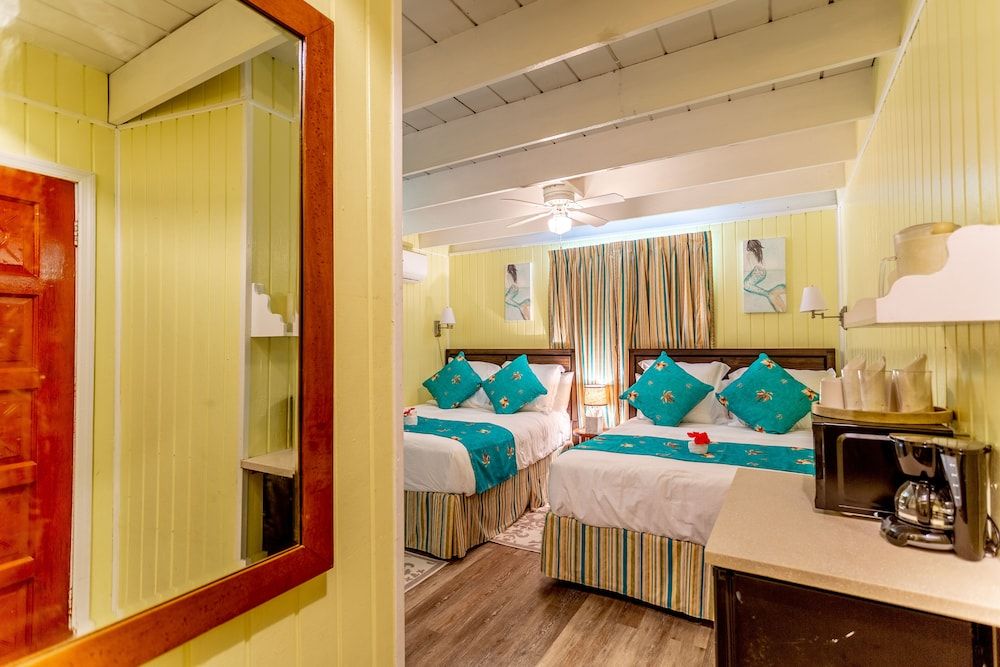 Basic Quadruple Room, 2 Queen Beds, Garden View (Tropical)