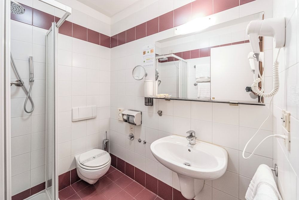 Hotel Italia Camera Comfort Quadrupla / Matrimoniale con due letti singoli 5