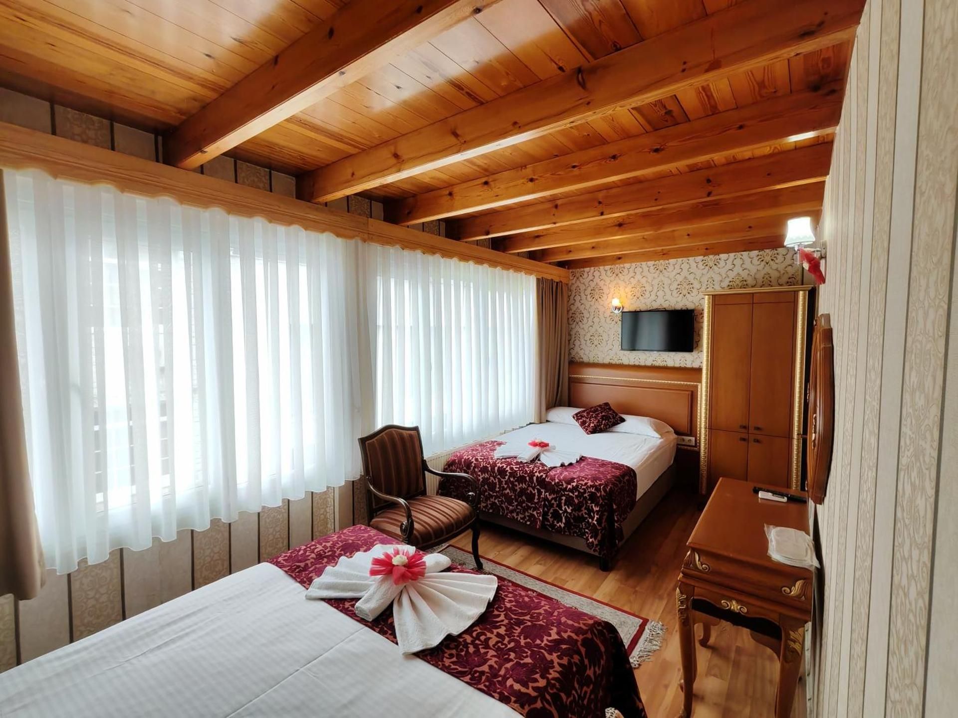 Deluxe Triple Room with Sea View