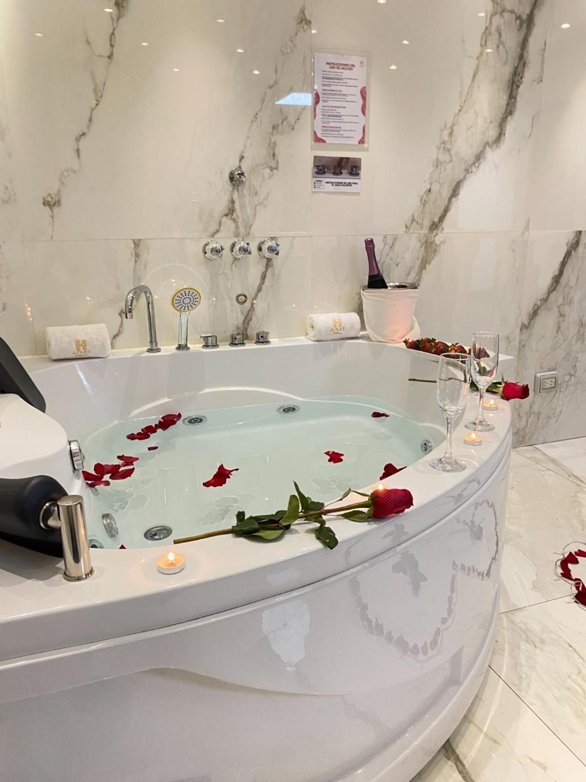 King Suite with Spa Bath and Balcony with Partial Ocean View