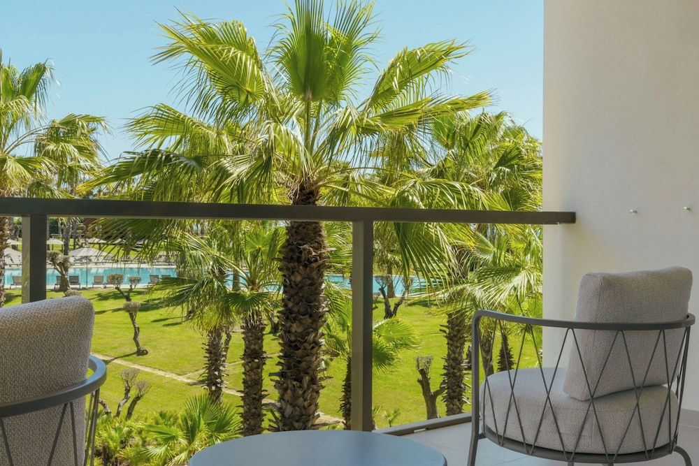 Junior Suite, 1 King Bed with Sofa bed, Pool View