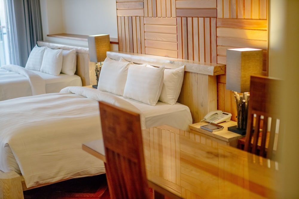 Deluxe Quadruple Room, 2 Double Beds, Sea View