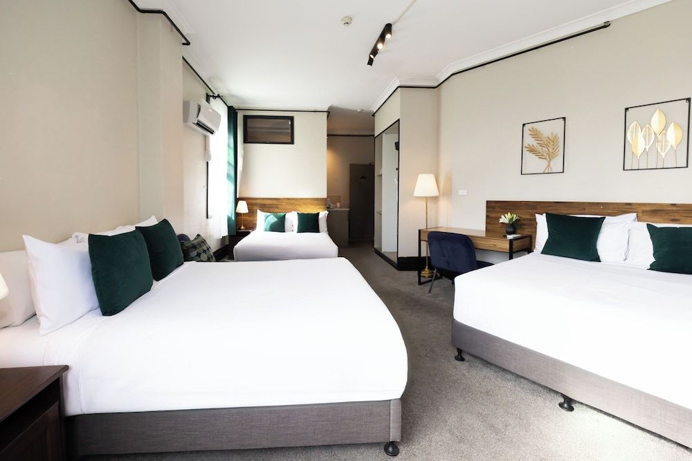 City Budget Hotel Deluxe Family Room 2