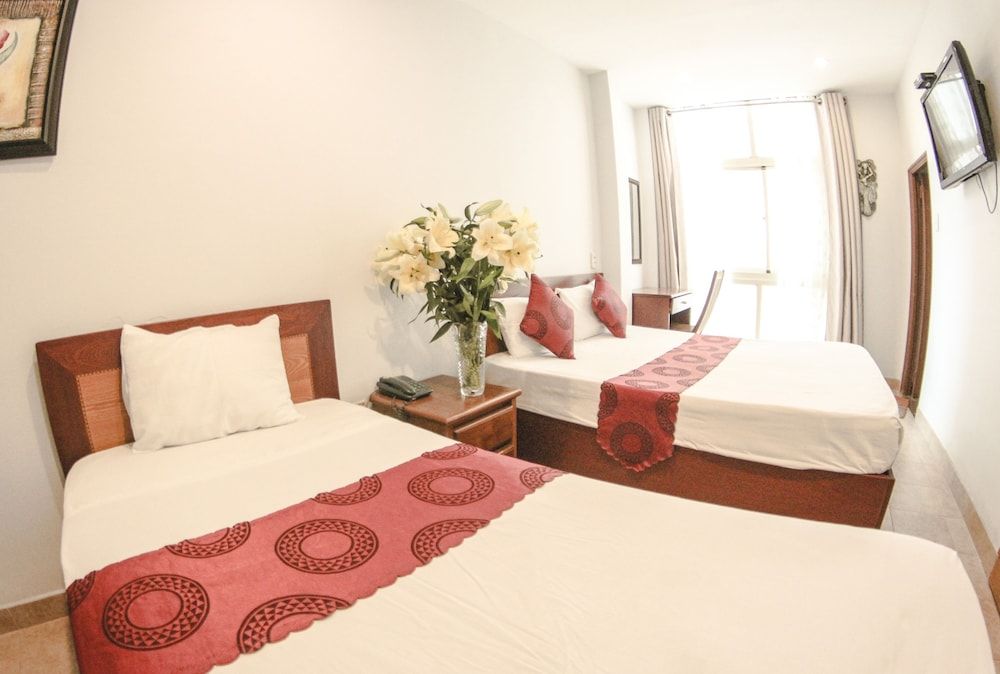 Deluxe Triple Room
