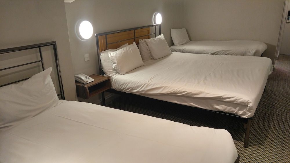 247 Hotel Quadruple Room