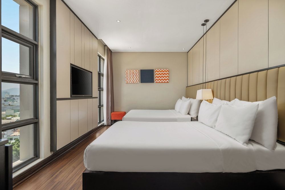 Sanouva Danang Hotel Deluxe Triple Room with afternoon tea daily 2