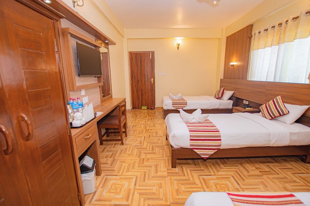 Deluxe Triple Room