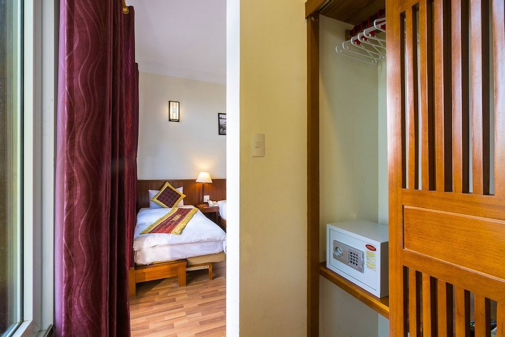 Riverside Oasis Villa Deluxe Triple Room 3