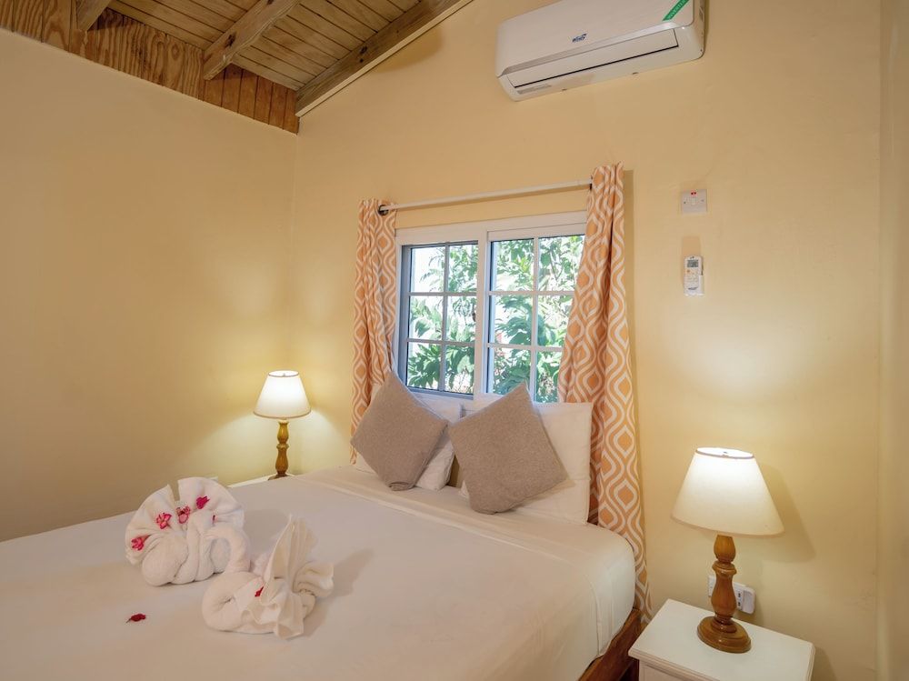 Beyond Sunset Resort & Villas 2 Bedroom Hibiscus Villa, Garden View, 3 People