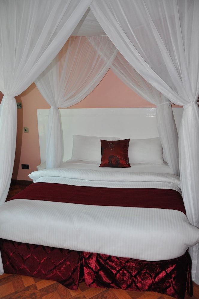 Karen Inn and Suites Deluxe Double Room 6