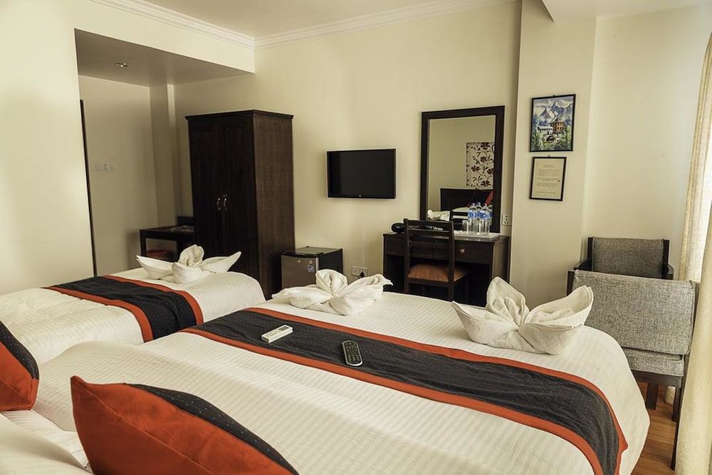 Tibet Peace Inn Deluxe Triple Room, 1 Bedroom 3