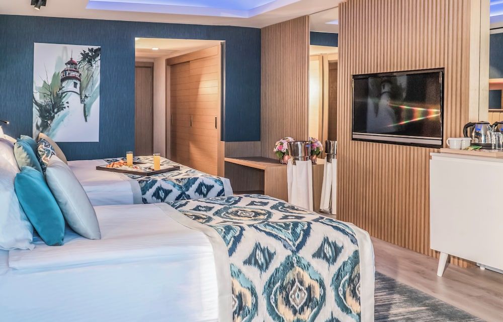 Superior Room, Multiple Beds, Non Smoking, Partial Sea View