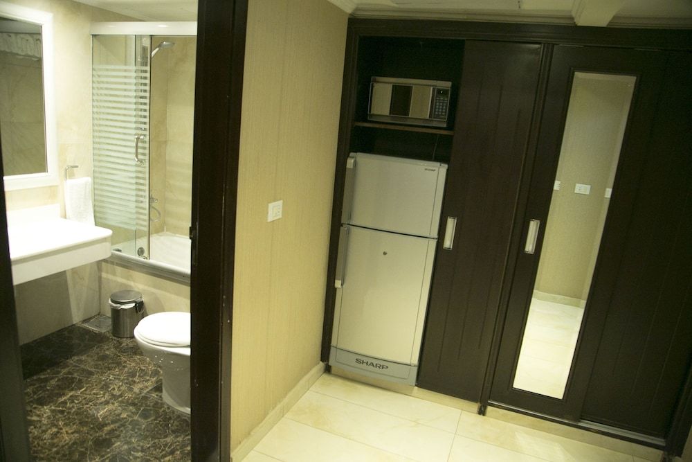 undefined Queen's Suite Hotel 8