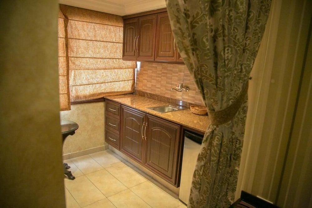 undefined Queen's Suite Hotel