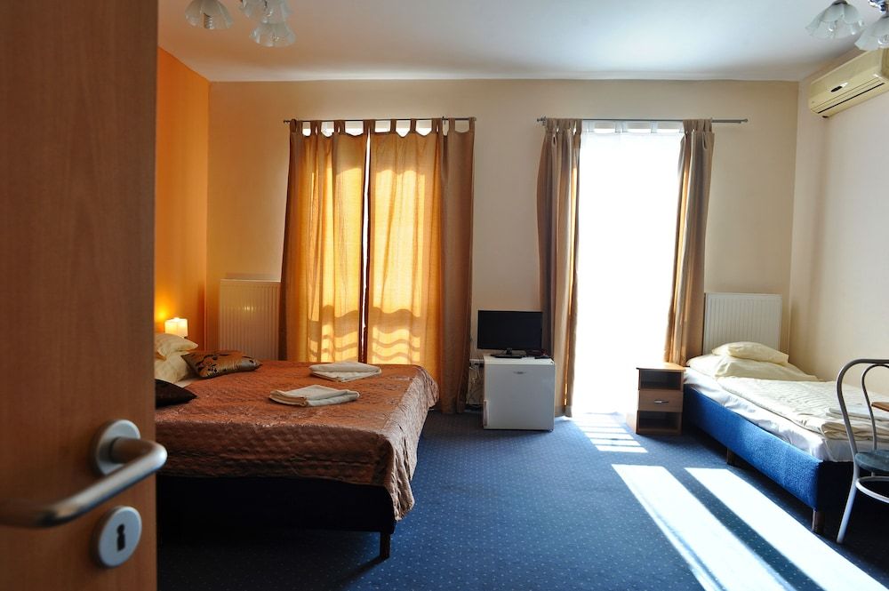 Hotel Papillon Quadruple Room