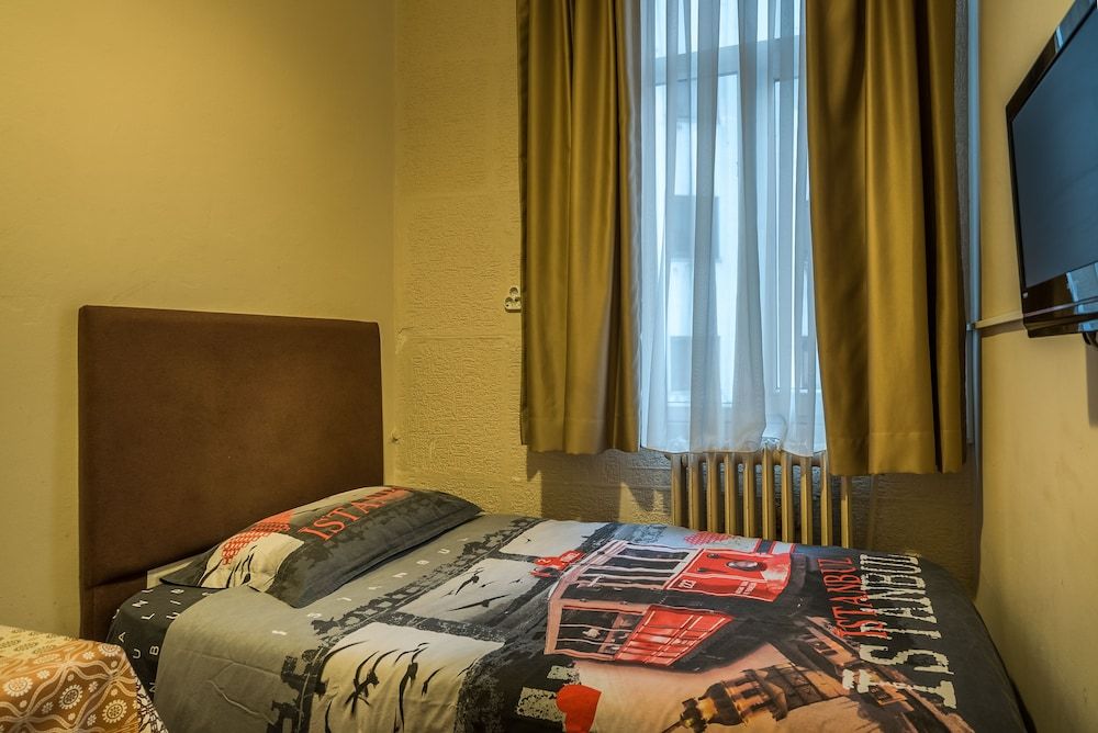 Economy Single Room, Non Smoking, Shared Bathroom