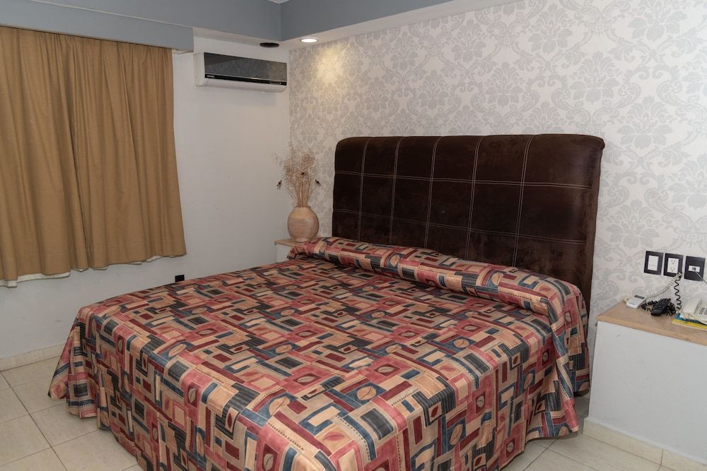 Impala Hotel in front of the ADO