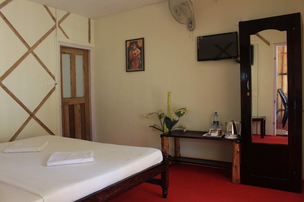Green Ark Resorts-Thekkady Deluxe Room 6