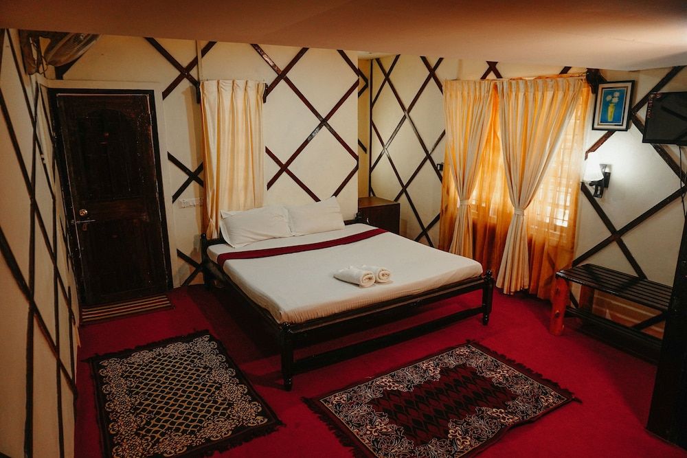 Green Ark Resorts-Thekkady Deluxe Room 9