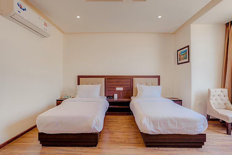 Twin Bed Premium with Partial Ganges View