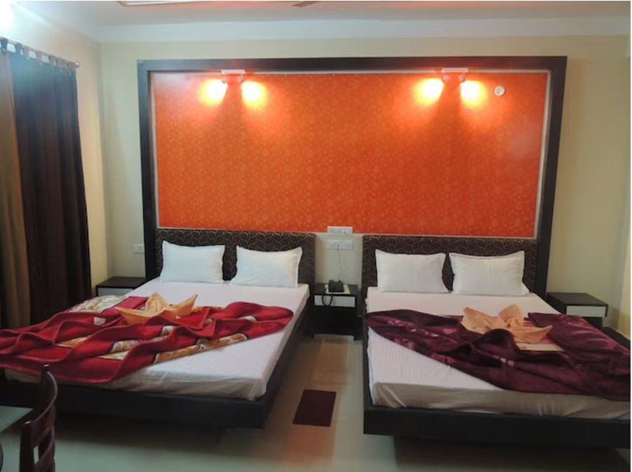 AC Deluxe Four Bed Room with Balcony