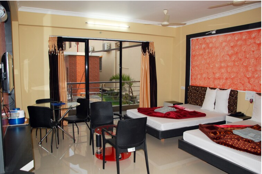 AC Deluxe Four Bed Room with Balcony