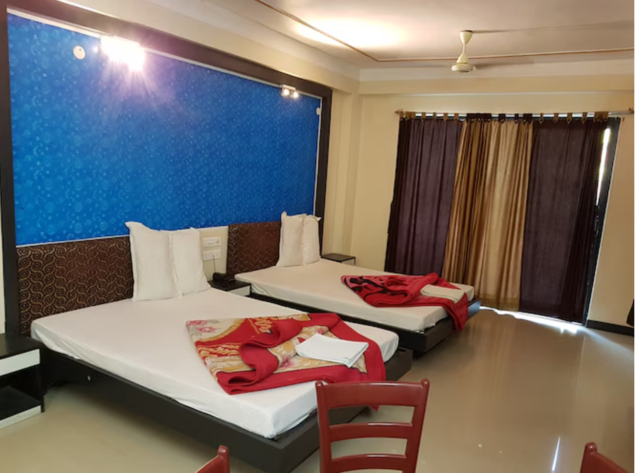 AC Deluxe Four Bed Room with Balcony